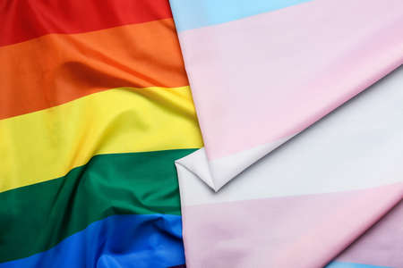 Transgender and rainbow LGBT flags as backgroundの写真素材