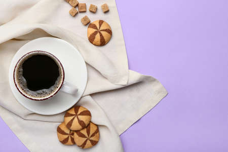 Composition with cup of tasty coffee and cookies on color backgroundの写真素材