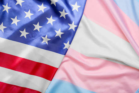 Transgender and USA flags as backgroundの写真素材