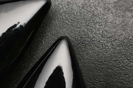 Stylish female shoes on dark background, closeupの写真素材