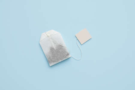 Tea bag on color backgroundの写真素材