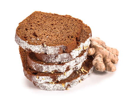 Pieces of gingerbread cake on white backgroundの写真素材