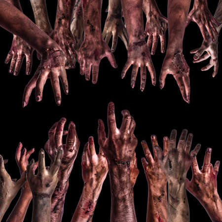 Many hands of scary zombies on dark backgroundの写真素材