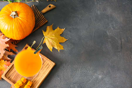 Autumn composition with pumpkin pie martini on dark backgroundの写真素材
