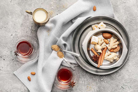 Composition with glasses of tasty Turkish tea on gray backgroundの写真素材