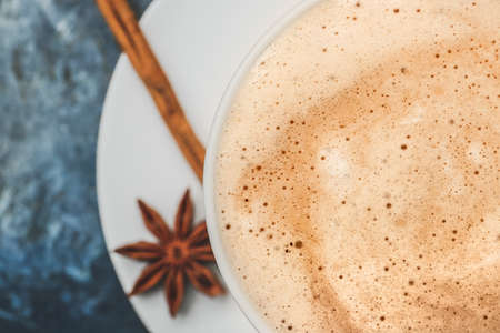 Cup of tasty latte on color background, closeupの写真素材