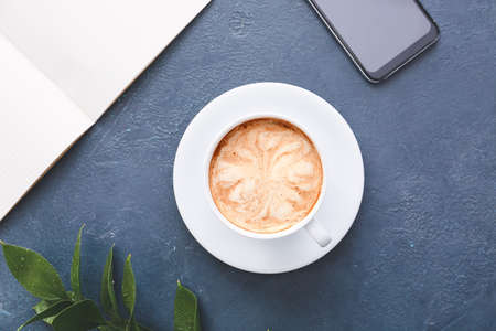 Cup of tasty latte on dark backgroundの写真素材