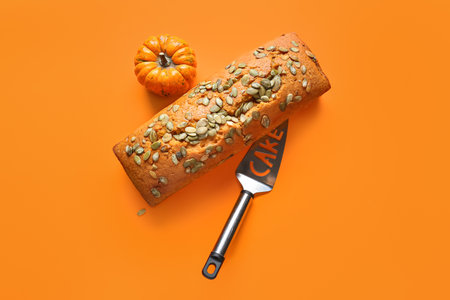 Tasty pumpkin pie on color backgroundの写真素材