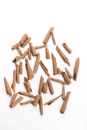 Delicious chocolate curls on white backgroundの写真素材
