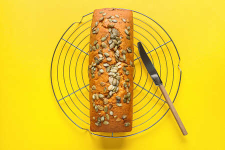 Tasty pumpkin pie on color backgroundの写真素材