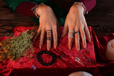 Fortune teller reading future at tableの写真素材