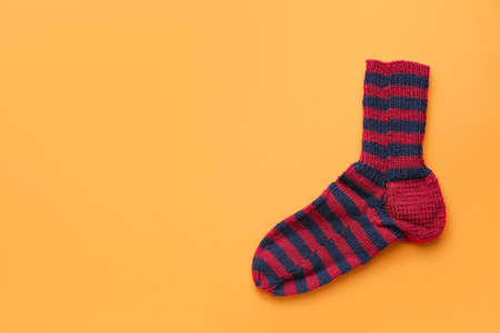 Warm sock on color backgroundの写真素材
