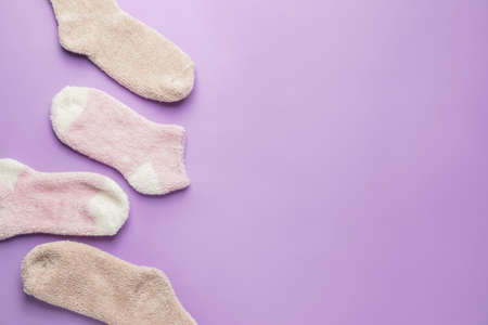 Warm socks on color backgroundの写真素材