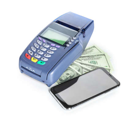 Payment terminal with mobile phone and money on white background