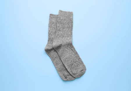 Warm socks on color backgroundの写真素材