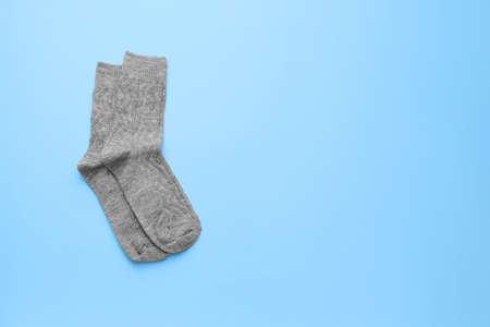Warm socks on color backgroundの写真素材