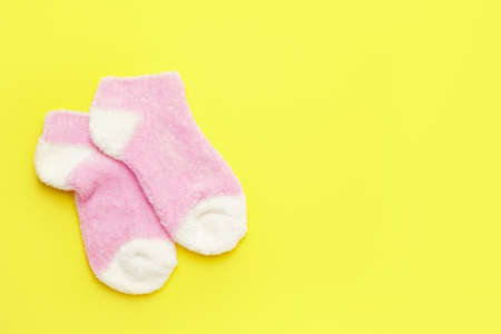 Warm socks on color backgroundの写真素材