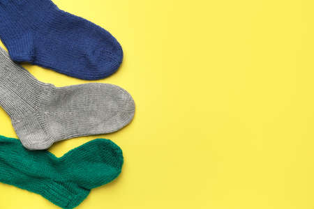Warm socks on color backgroundの写真素材