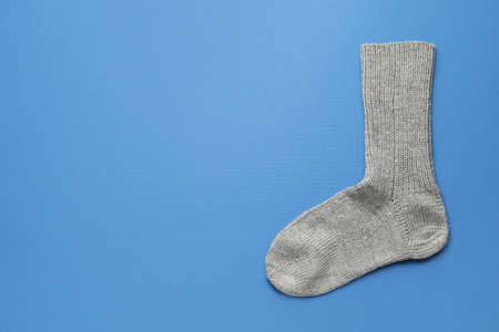 Warm sock on color backgroundの写真素材