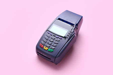 Payment terminal on color backgroundの写真素材