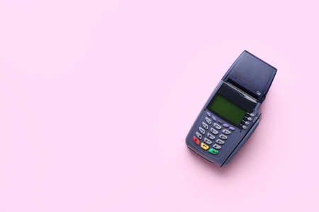 Payment terminal on color backgroundの写真素材