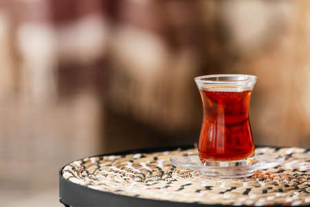 Cup of hot tea on tableの写真素材