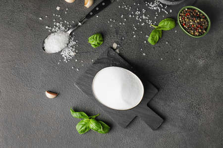 Composition with salt on dark backgroundの写真素材