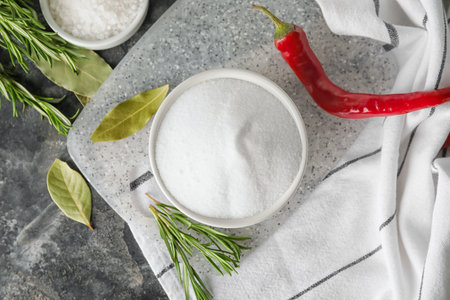 Composition with salt on dark backgroundの写真素材