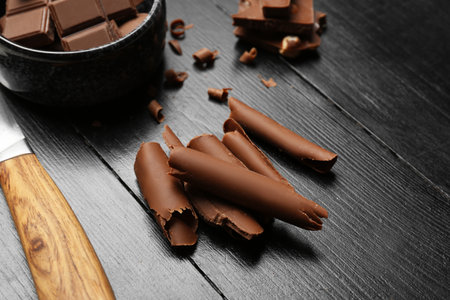 Delicious chocolate curls on table, closeupの写真素材