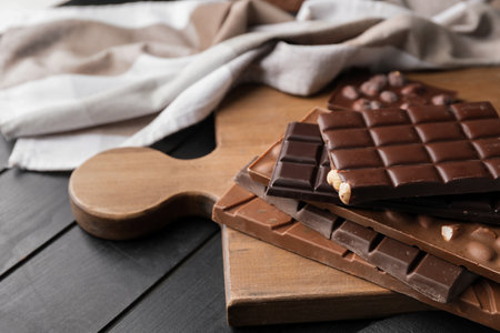Different chocolate bars on dark backgroundの写真素材