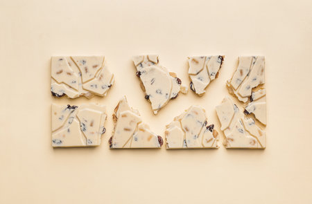 Sweet white chocolate on color background