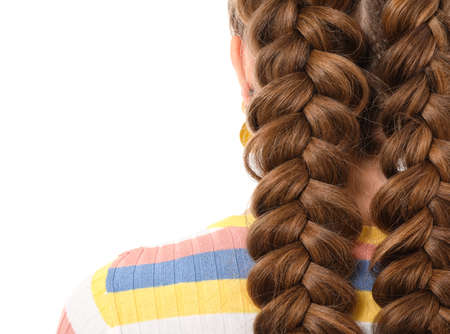 Beautiful young woman with braided hair on white background, closeup