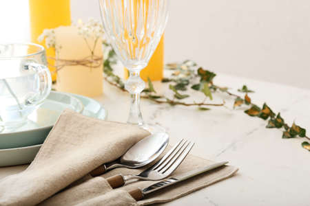 Beautiful table setting on grunge background