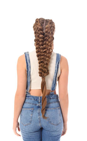 Beautiful young woman with braided hair on white background