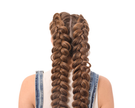 Beautiful young woman with braided hair on white backgroundの写真素材