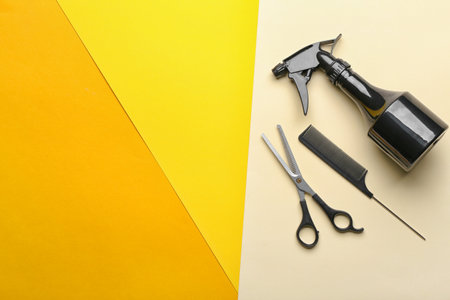 Set of hairdresser's tools on colorful backgroundの写真素材