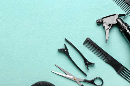 Set of hairdresser's tools on color backgroundの写真素材