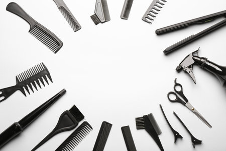 Frame made of hairdresser's tools on white backgroundの写真素材