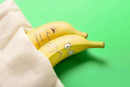 Creative composition with bananas on color background, closeupの写真素材