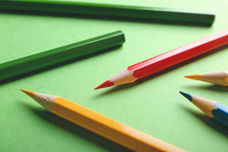 Set of colorful pencils on color backgroundの写真素材
