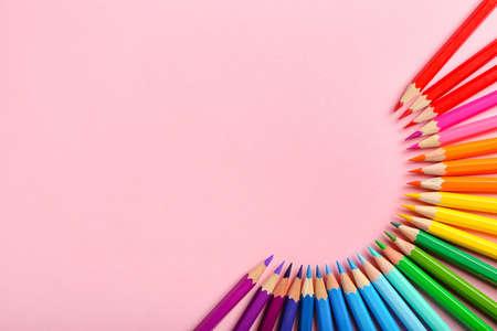 Composition with colorful pencils on color backgroundの写真素材