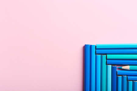 Composition with colorful pencils on color backgroundの写真素材