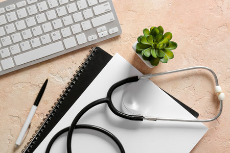 Composition with modern stethoscope on color background, closeupの写真素材