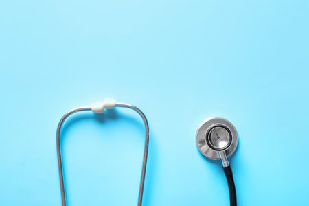 Modern stethoscope on color backgroundの写真素材