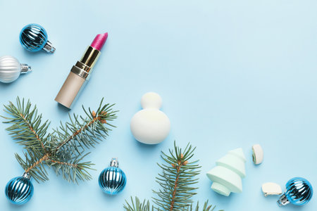 Christmas composition with cosmetics on color backgroundの写真素材