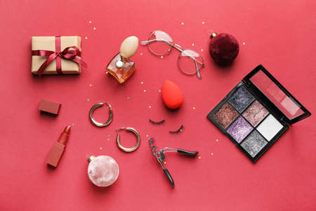 Christmas composition with cosmetics on color backgroundの写真素材