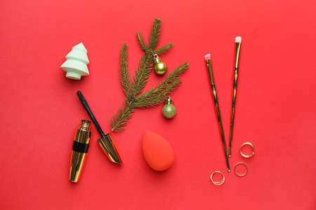 Christmas composition with cosmetics on color backgroundの写真素材