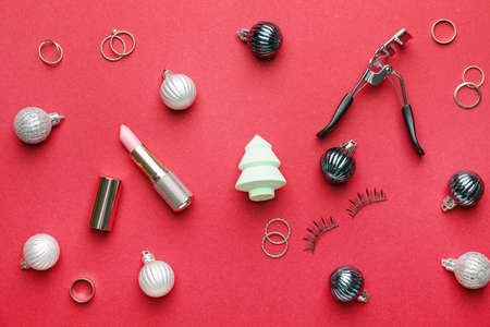 Christmas composition with cosmetics on color backgroundの写真素材