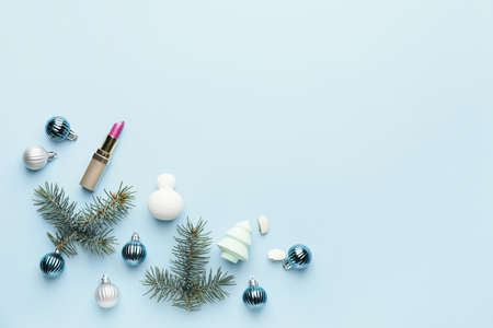 Christmas composition with cosmetics on color backgroundの写真素材