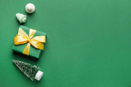 Christmas decor and makeup sponges on color backgroundの写真素材